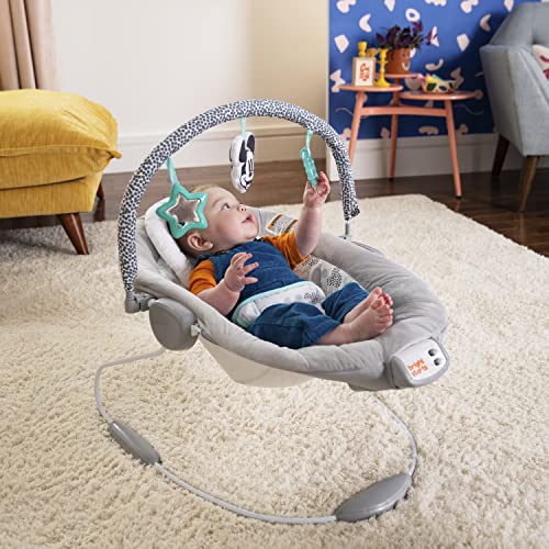 MICKEY MOUSE Comfy Disney Baby Bouncer in Cloudscapes Includes Toy Bar with 3 Cute Toys, Plays 7 Soothing Melodies w/Auto Shut-Off, Age 0-6 Months