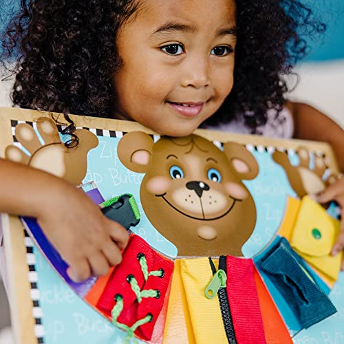 Melissa and Doug Basic Skills Puzzle Board - Wooden Educational Toy - Learn To Button Busy Board, Activity Board For Fine Motor Skills, Developmental Toy For Toddlers Ages 3+
