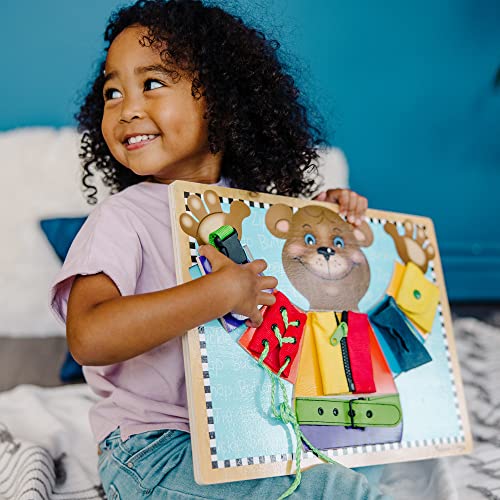 Melissa and Doug Basic Skills Puzzle Board - Wooden Educational Toy - Learn To Button Busy Board, Activity Board For Fine Motor Skills, Developmental Toy For Toddlers Ages 3+