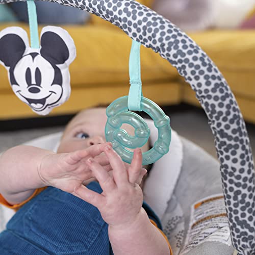 MICKEY MOUSE Comfy Disney Baby Bouncer in Cloudscapes Includes Toy Bar with 3 Cute Toys, Plays 7 Soothing Melodies w/Auto Shut-Off, Age 0-6 Months