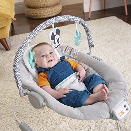 MICKEY MOUSE Comfy Disney Baby Bouncer in Cloudscapes Includes Toy Bar with 3 Cute Toys, Plays 7 Soothing Melodies w/Auto Shut-Off, Age 0-6 Months