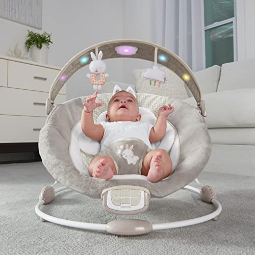 Ingenuity InLighten Baby Bouncer Infant Seat with Light Up Toy Bar, Vibrations, Tummy Time Pillow and Sounds, 0-6 Months Up to 20 lbs (Twinkle Tails Bunny)